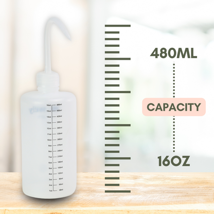 Clear Mossify squirtr bottle with measurement markings showing 480 ml / 16 oz